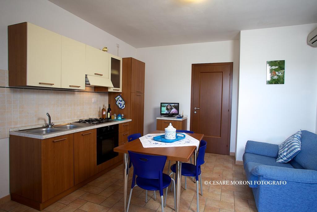 Residence Ai Campi Da Golf Сатурнія Номер фото
